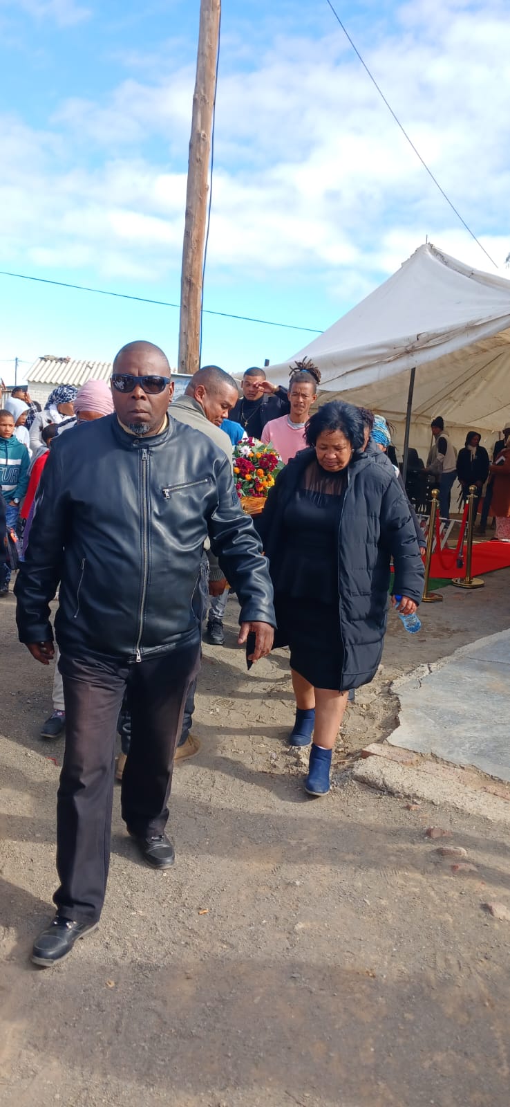 Family being escorted with dignity at a G.H.G. funeral service