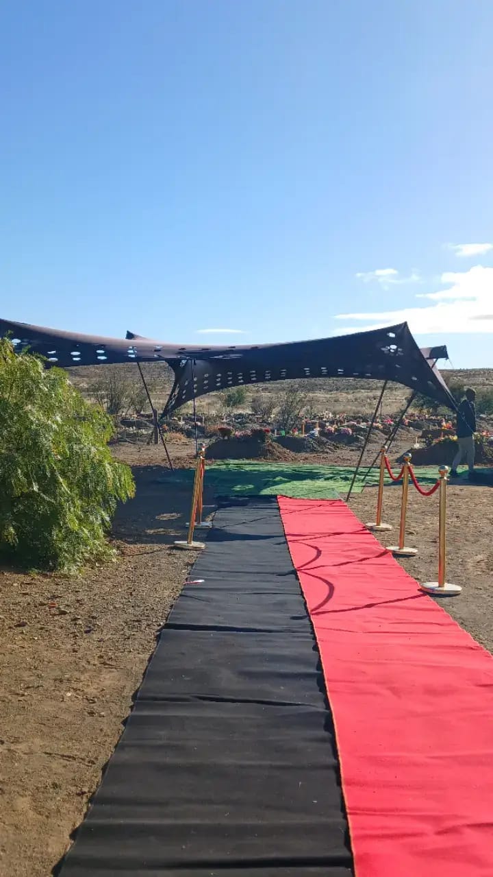 Walkway and canopy set up at the burial site